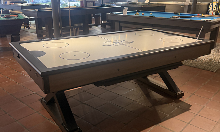 Brunswick Air Hockey with Dining top on Skillful home Showroom Floor