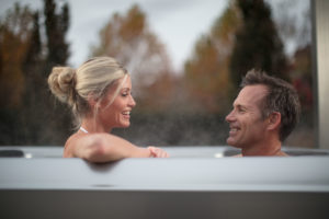 Couple enjoying life in their Bullfrog Spa